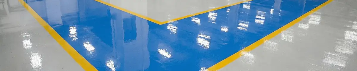 A factory floor professionally covered and marked with epoxy flooring in Baltimore, MD