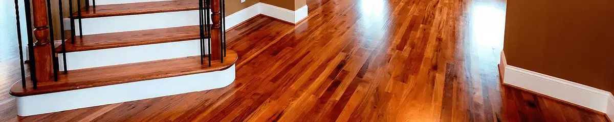 Base floor of a staircase with professionally restored wood flooring in Baltimore MD