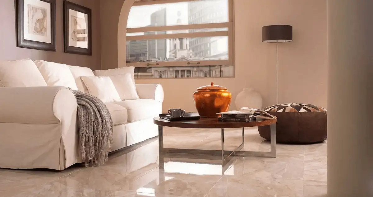 Modern living room with professionally installed marble flooring, a beige sofa, coffee table in Baltimore, MD