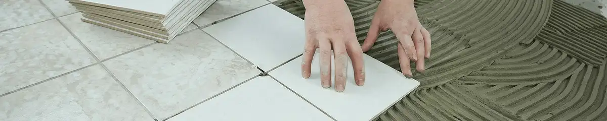 Professional installing white tile floors in Baltimore, MD