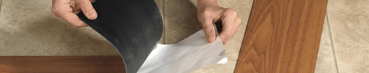 A professional installing vinyl flooring in Baltimore, MD