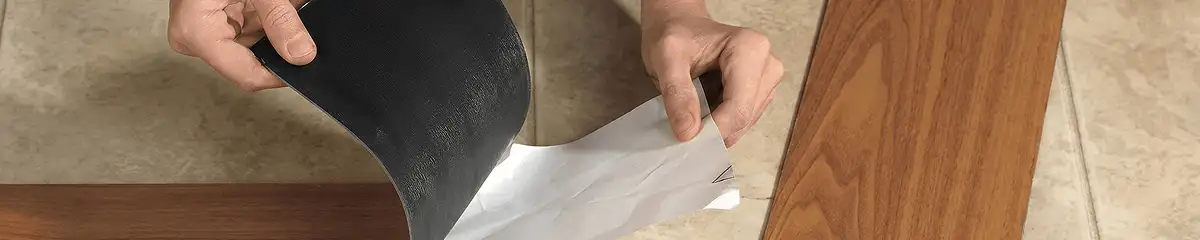 A professional installing vinyl flooring in Baltimore, MD